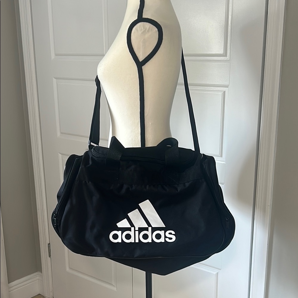 Adidas Black Duffel Travel Weekender Bag with Durable Fabric and Classic Design